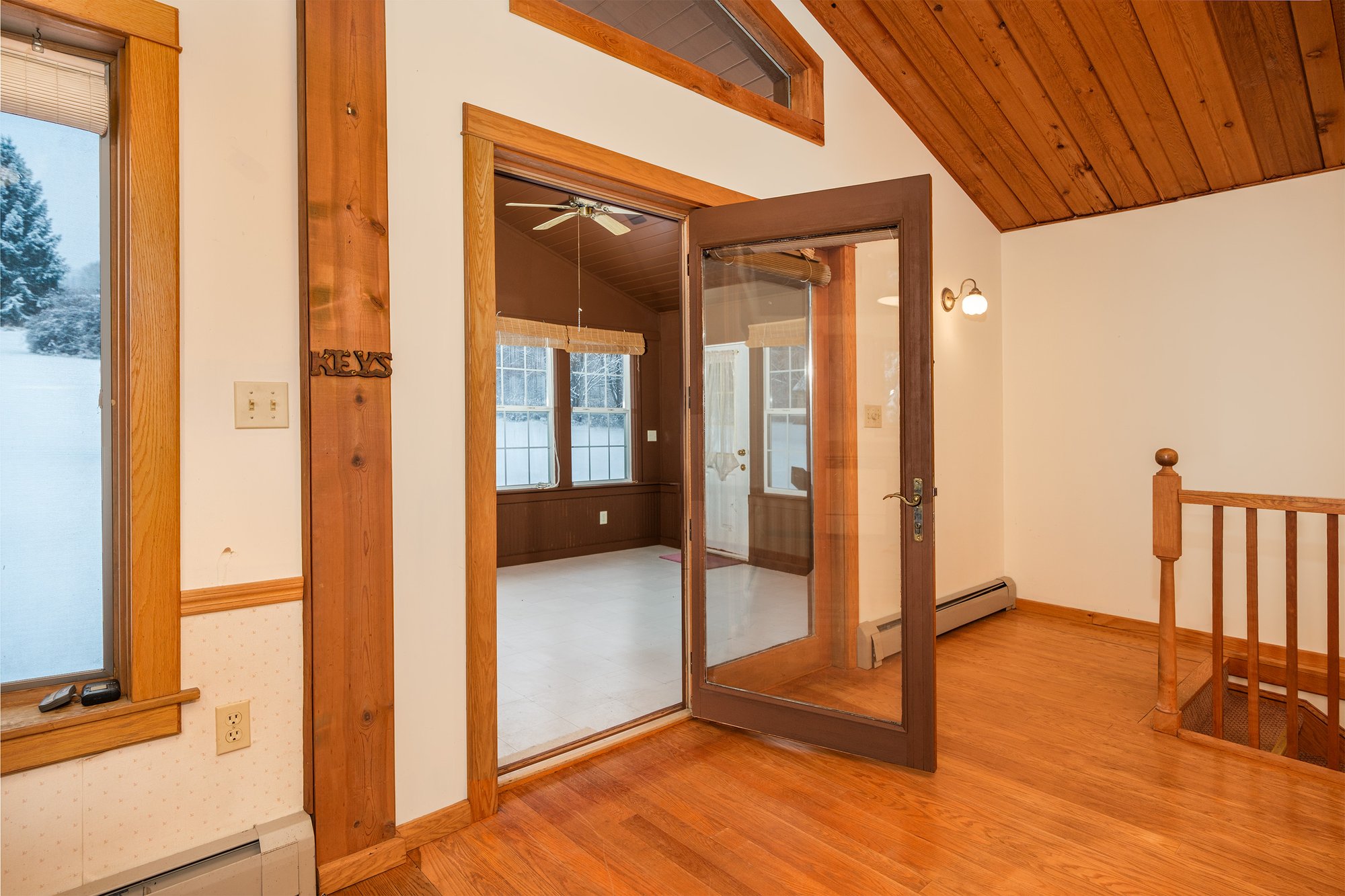 16 Kitchen looking into sunroom - 260 Southside Dr