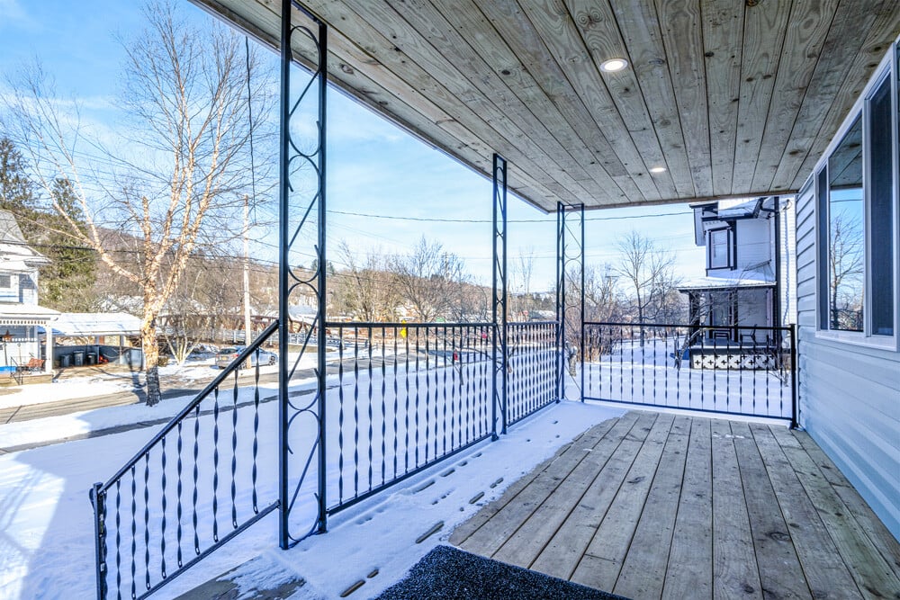 Covered Front Porch with Bridge View -- 51 Delaware St, Delhi, NY